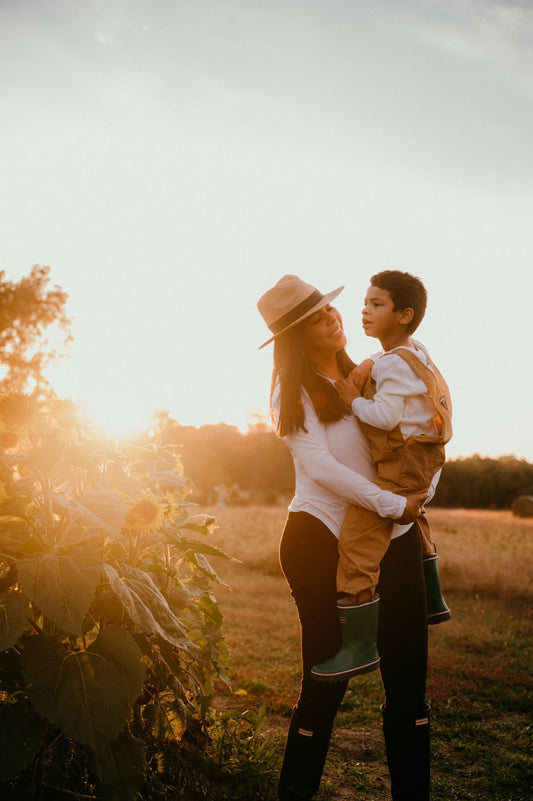 Founder of Carter Wade Iris Medina-Elston holding her son Carter Wade Elston