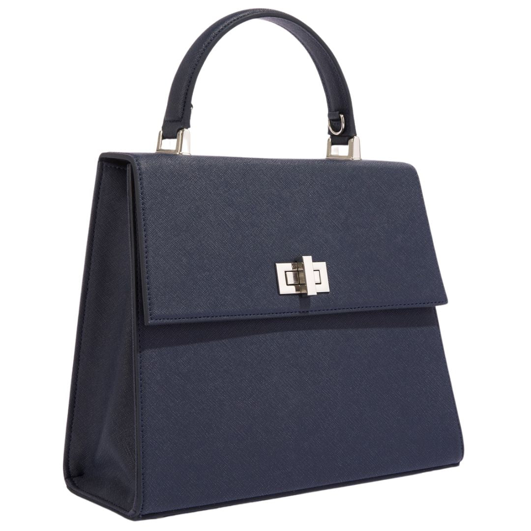 The She-EO handbag in navy blue cactus leather, displayed in a side profile to highlight its structured silhouette, premium vegan leather texture, and Italian hardware. A timeless statement piece for sustainable luxury.