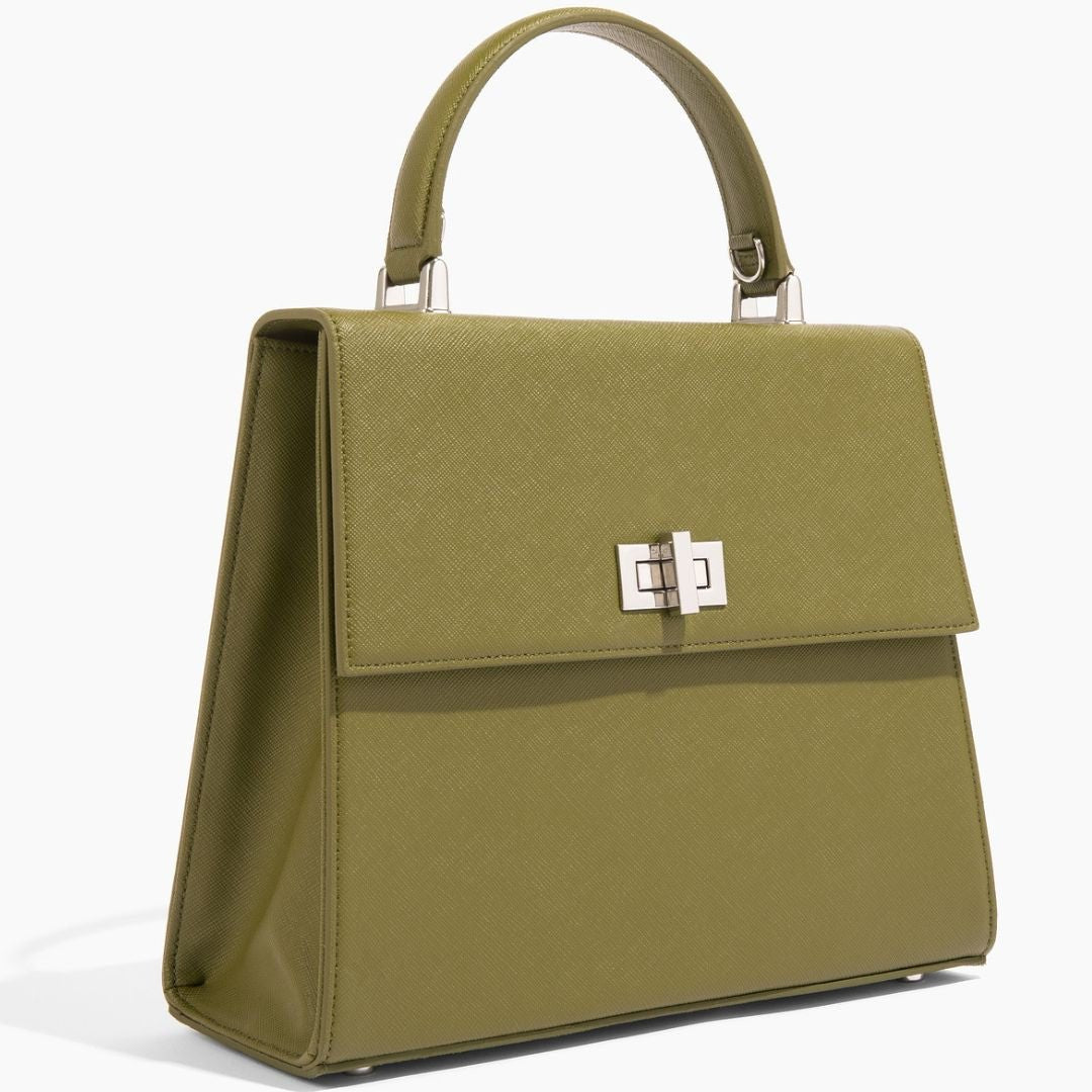 The She-EO handbag in Olive Cactus Leather displayed against a white background. Its structured silhouette, high-quality vegan leather texture, and elegant Italian hardware highlight its sustainable and sophisticated design.